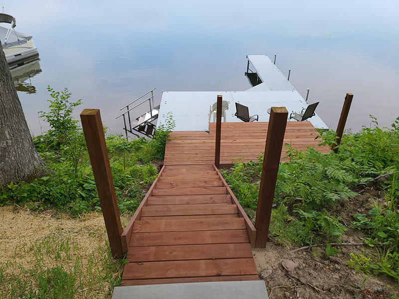 stairs leading out to dock on lake